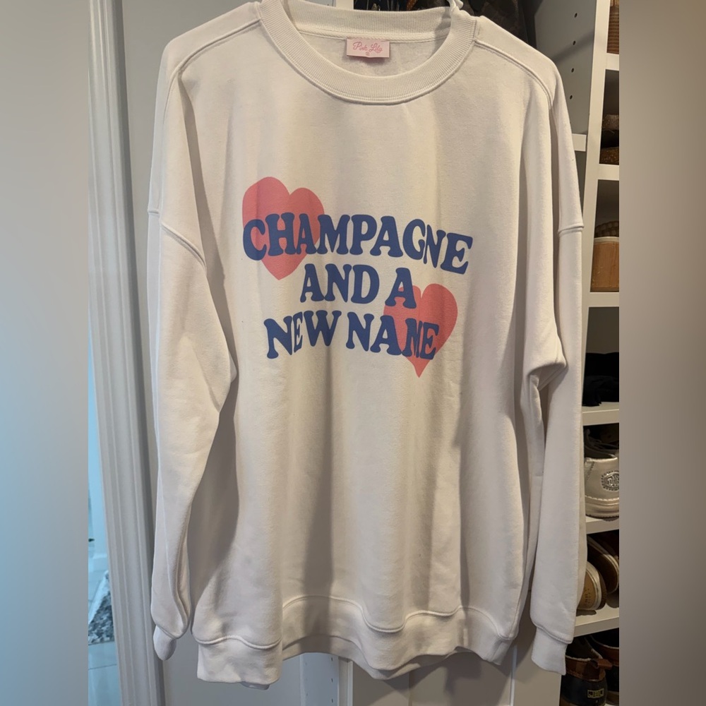 Pink Lily Oversized Sweatshirt "CHAMPAGNE AND A NEW NAME"